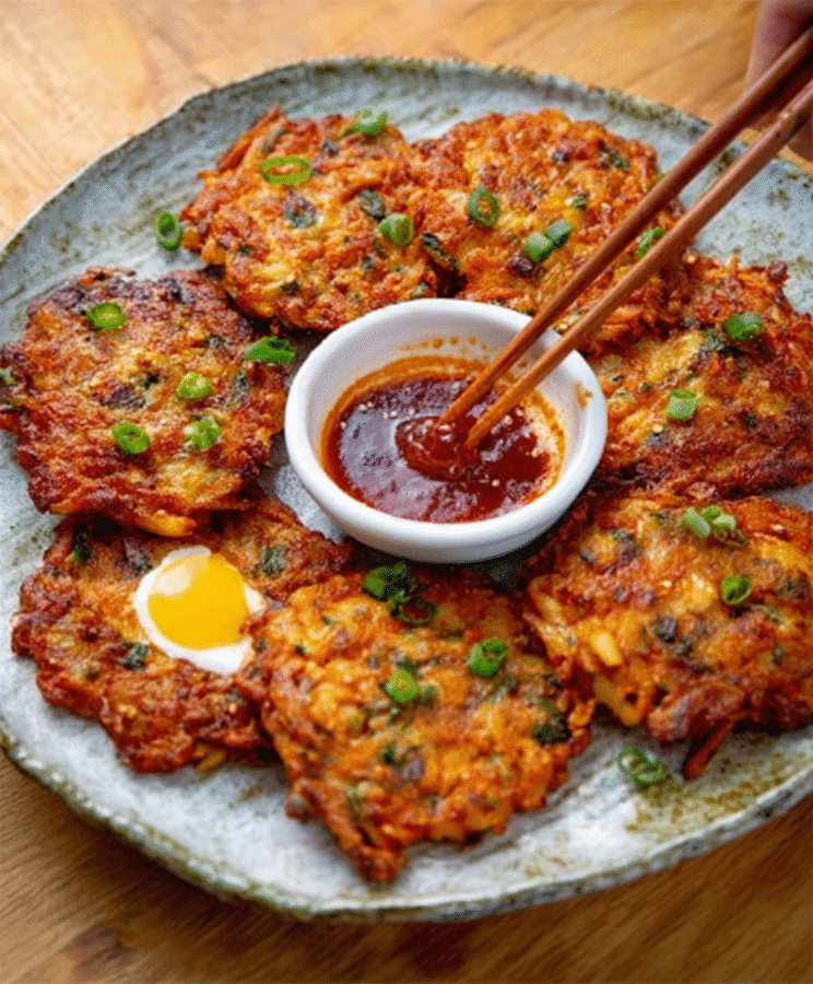 Crispy Kimchi Potato Pancakes with Gochujang Sour Cream delight your taste buds! 5 Crispy Kimchi Potato Pancakes with Gochujang Sour Cream