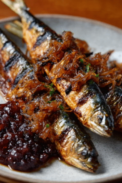 Smoky grilled sardine skewers with cherry cough chutney
